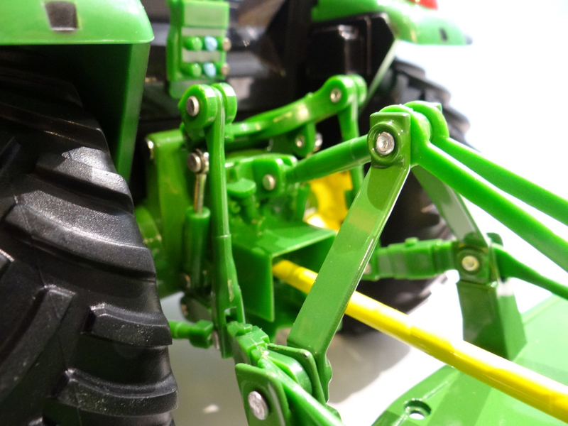 Illustration for article titled Tractor Thursday 1:16 ERTL John Deere 5095M w/ Mower